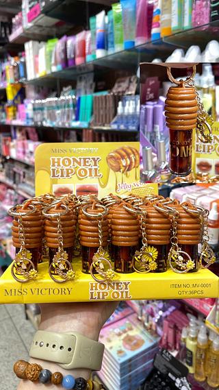 Lip oil honey com chaveiro miss victory